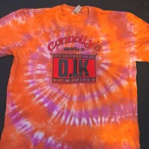 Never worn tie dye patterned tee that is pink and orange